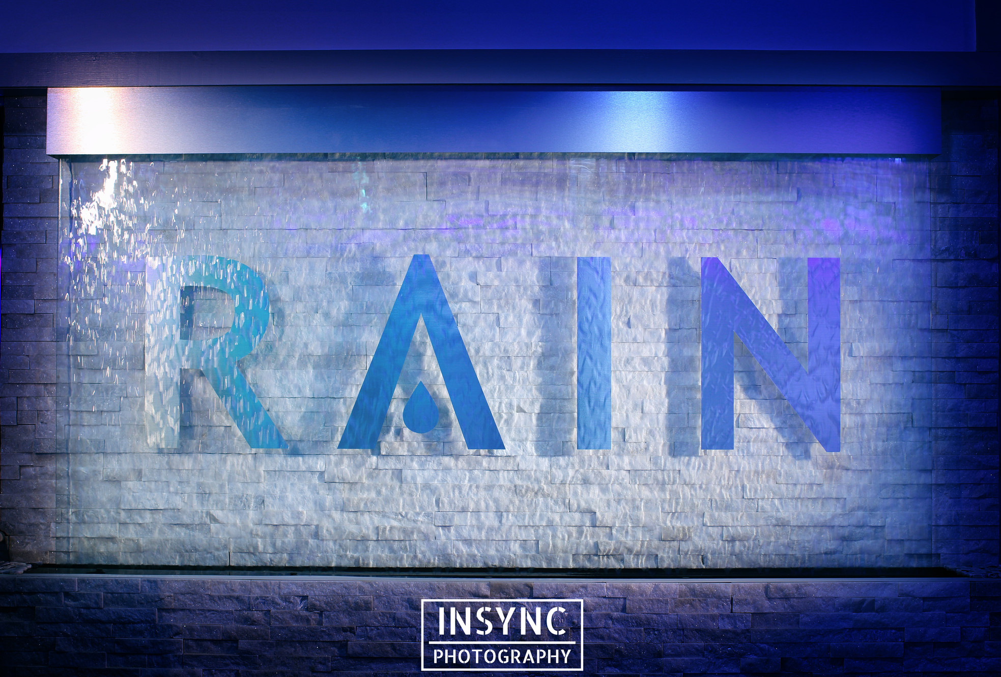 Illuminated RAIN venue sign